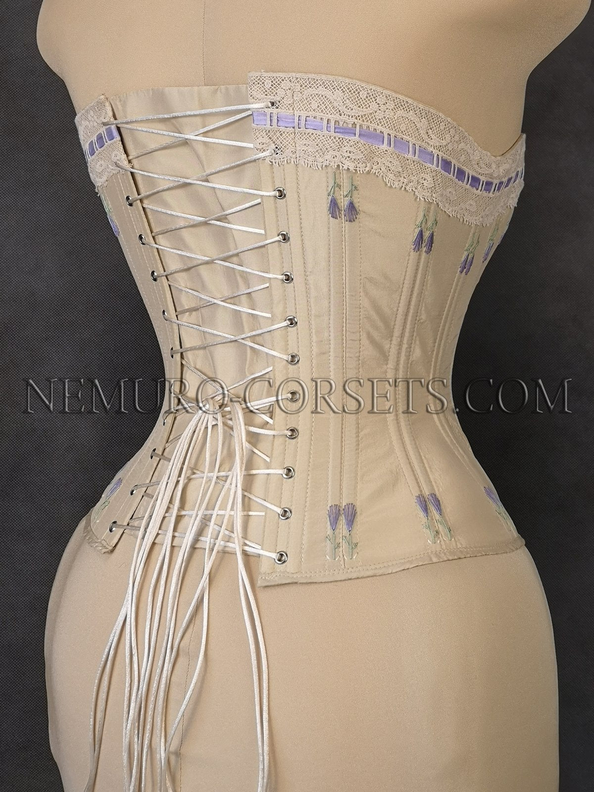 ONE CORSET & TWO CORSET COVERS, 1870-1900 & 1950s sold at auction